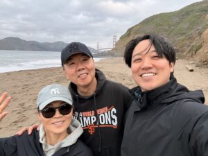 Daniel with his parents Janet and Min Cho